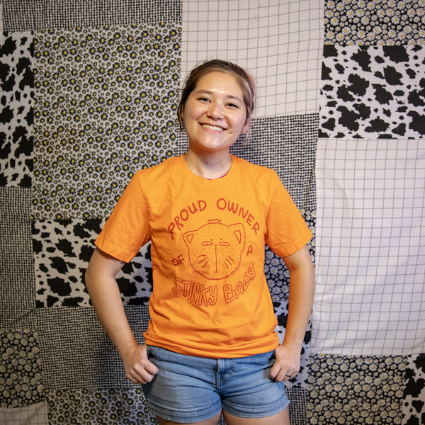 Proud Owner of a Stinky Baby | Screen Printed Unisex Tee | Orange Fruit Cat Illustration