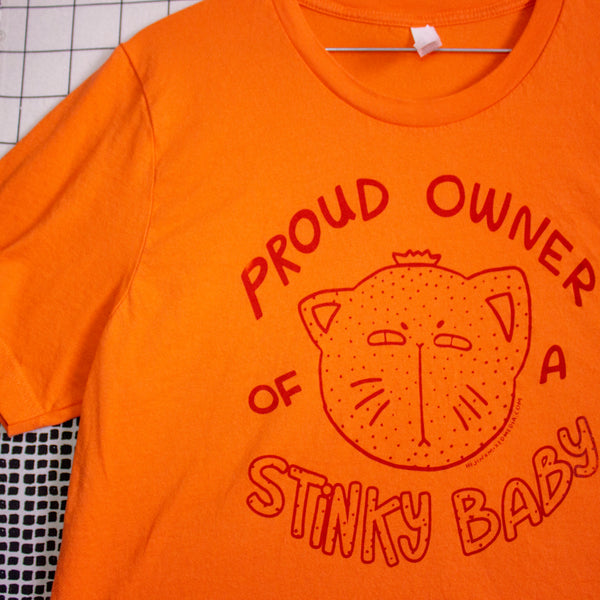 Proud Owner of a Stinky Baby | Screen Printed Unisex Tee | Orange Fruit Cat Illustration
