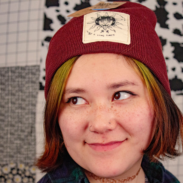 Here For A Good Time Not A Long Time Beanie | Serigraph Patch on Recycled Beanie